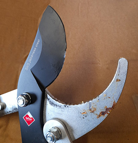 slijtage aan snijbladen van takkenschaar